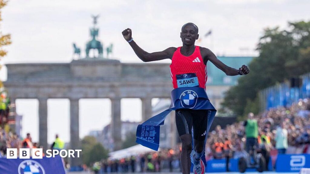 Sabastian Sawe crosses the finish line at the Berlin Marathon