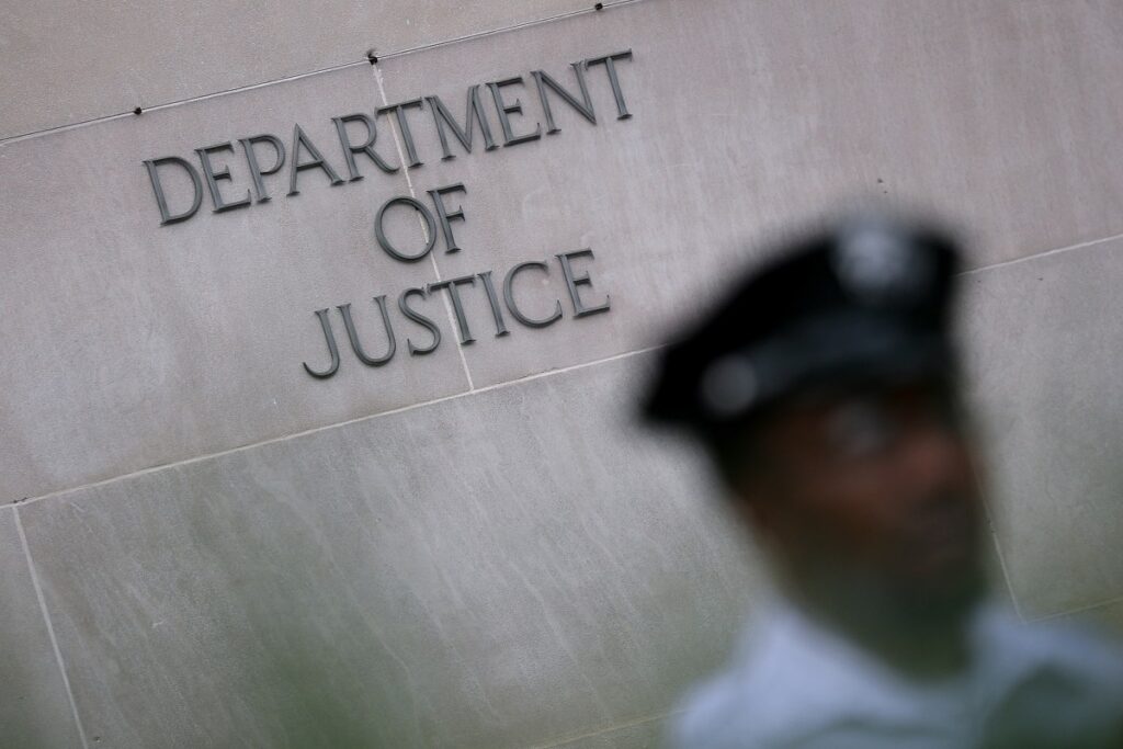 a photo of outside the DOJ in Washington DC