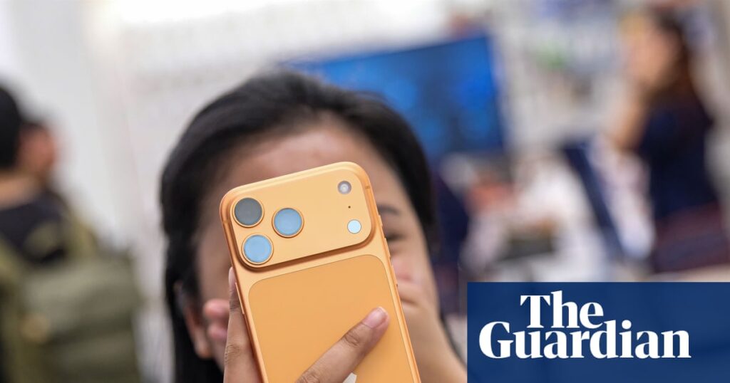 Apple hits $4tn market value as new iPhone models revitalize sales | Apple Apple hits $4tn market value as new iPhone models revitalize sales | Apple