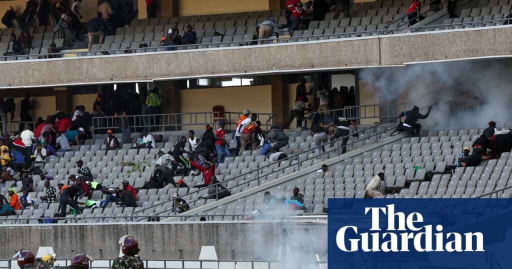Kenyan police fire teargas to disperse mourners at Raila Odinga's public viewing – video | Kenya