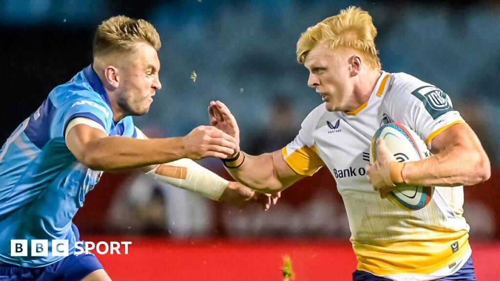 Tommy O'Brien runs with the ball